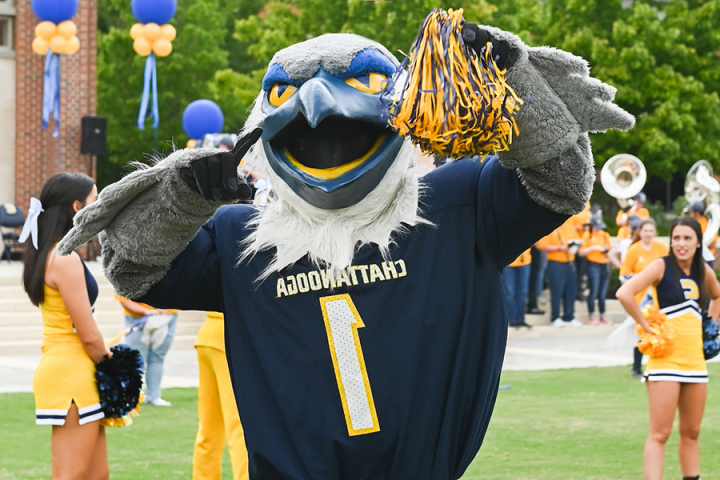 Photograph of Scrappy the mascot at a homecoming event